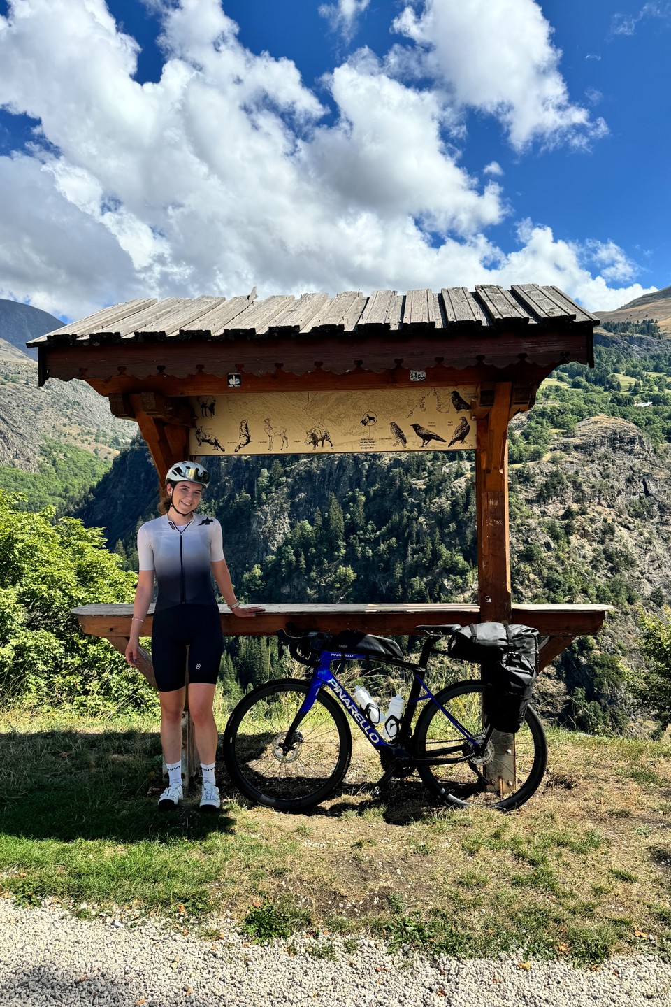 Amy Hudson Next To Blue Pinarello