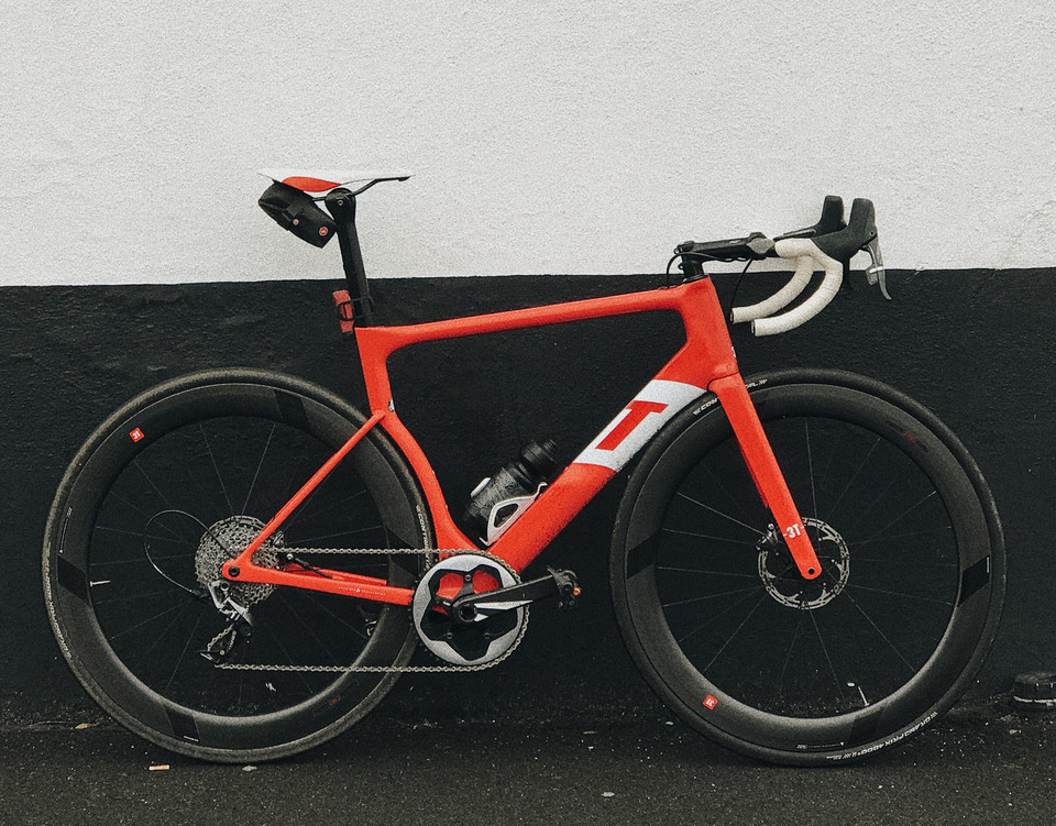 3T Strada Team Road Bike against a wall