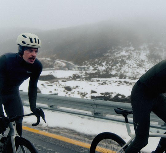 Cyclists Riding in Winter
