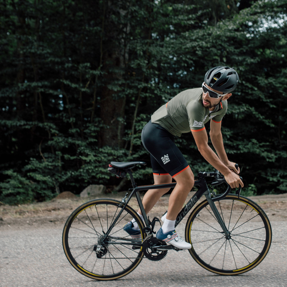 Cyclist Climbing Out of The Saddle