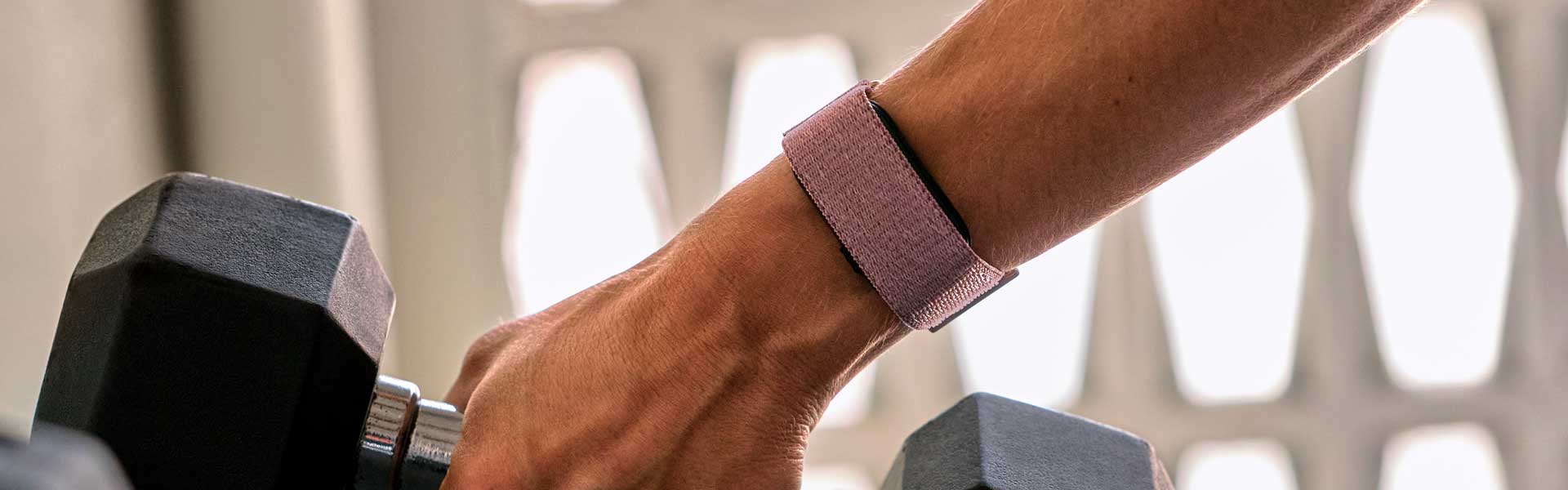 Garmin CIRQA Smart Band on gym goer