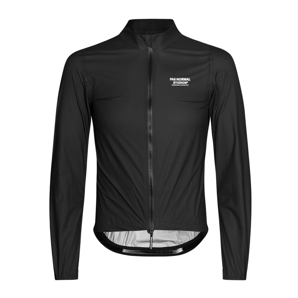 Sigma Sports Pas Normal Studios Mechanism Pertex Rain Jacket | Discount Codes available, easy returns, up to £25 off with Newsletter Signup, FREE Postage over £60