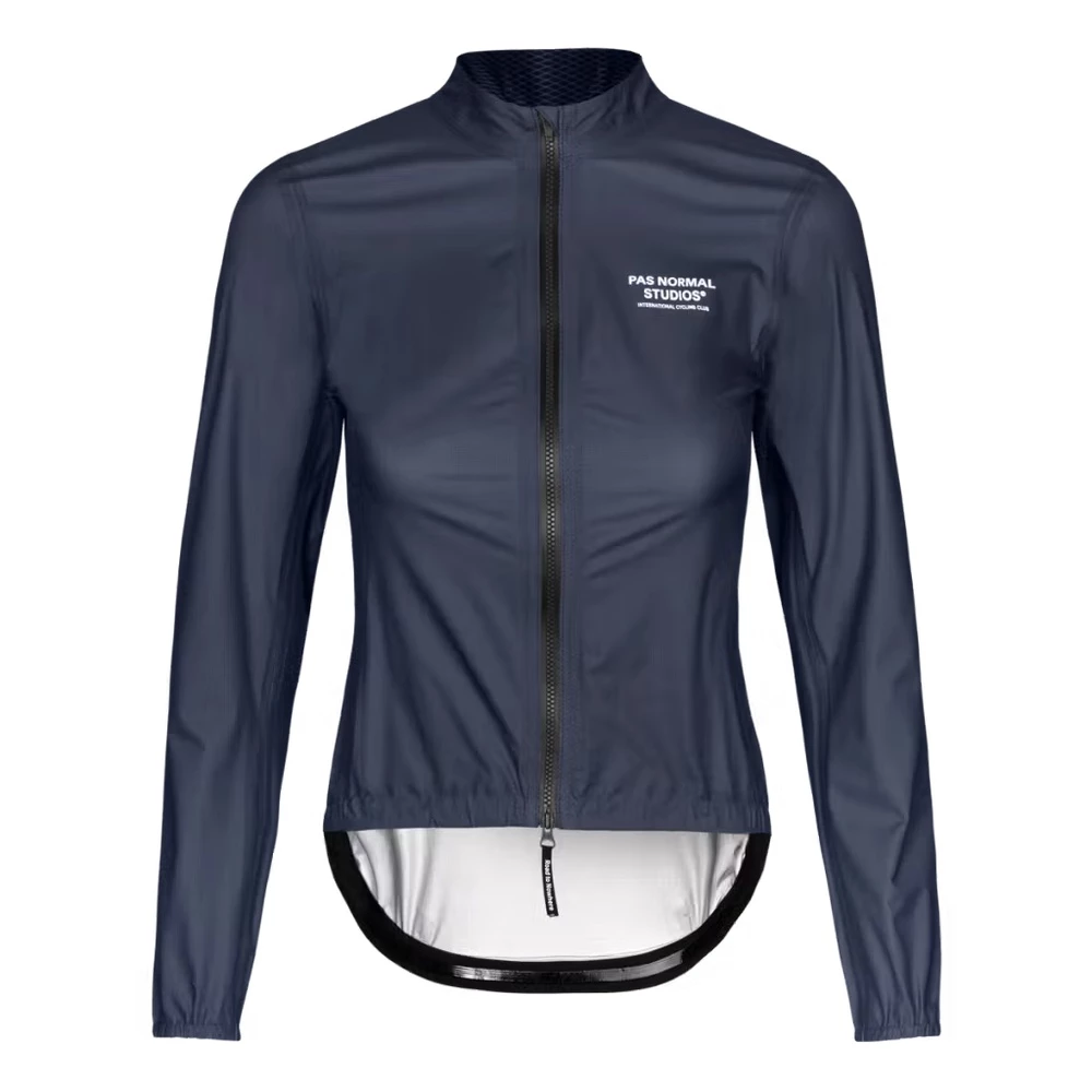 Sigma Sports Pas Normal Studios Mechanism Womens Rain Jacket | Discount Codes available, easy returns, up to £25 off with Newsletter Signup, FREE Postage over £60