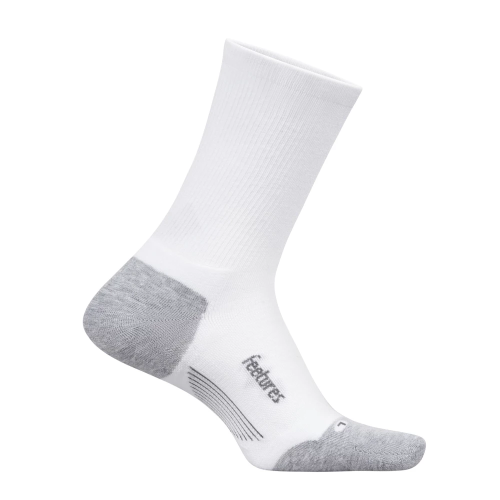 Sigma Sports Feetures Elite Max Cushion Mini Crew Running Socks | Discount Codes available, easy returns, up to £25 off with Newsletter Signup, FREE Postage over £60